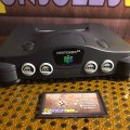 Игровая приставка Nintendo 64 NUS-001 чёрная (б/у) + игра The Legend of Zelda: Ocarina of Time (б/у)